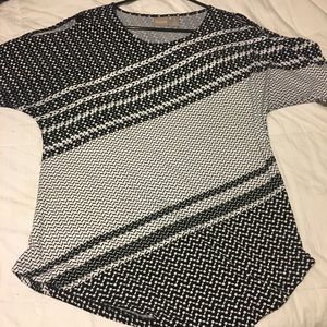 Chico’s cold shoulder angled top.